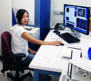 woman using a mass spectrometer