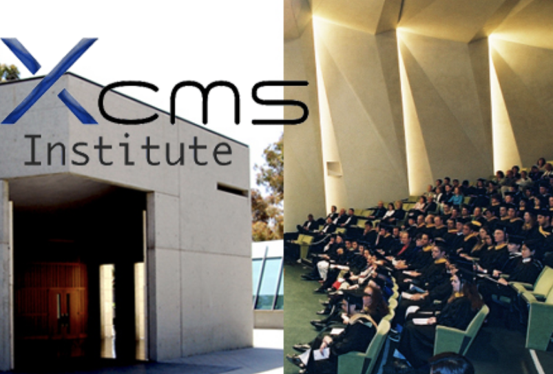 Lecture hall with XCMS Institute logo